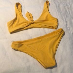 Yellow two piece bathing suit 👙